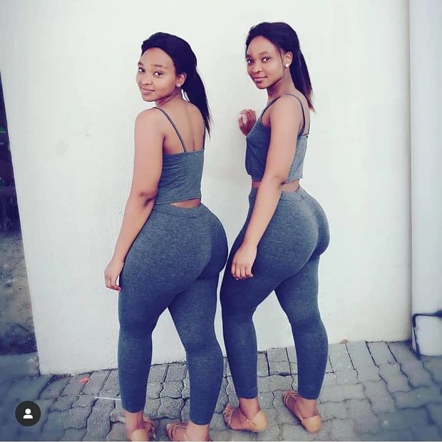 African twins with big butts in skin-tight leggings