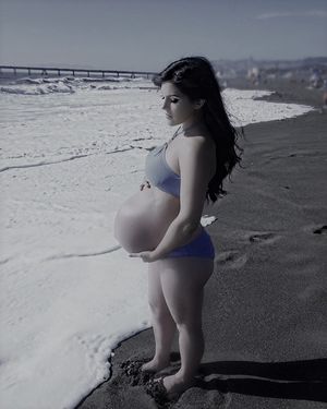Pregnant On The Beach