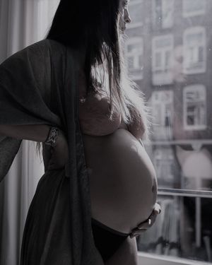 Pregnant At The Window