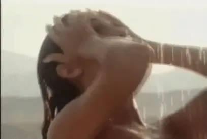 showering naked on beach