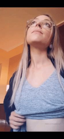 Babe in glasses flashes.