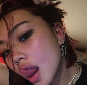 Beautiful face tongue out freckles sexy non-nude