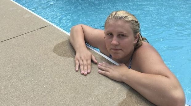 Teen on the edge of the pool