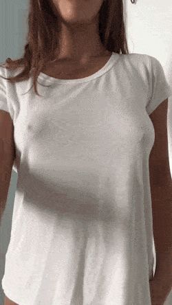 Cute Babe Revealing Titties From White Top