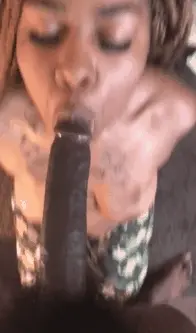 Beautiful ebony with dick in her mouth