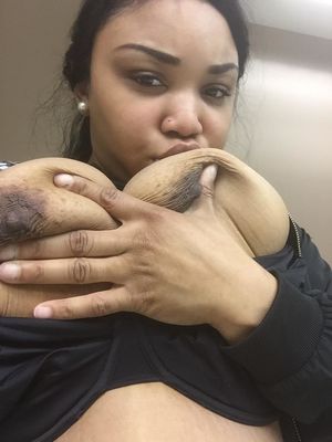 ebony selfie #2: kissing her own tits