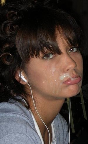 Unhappy cum covered chick with earbuds in