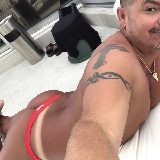 Sexy male with thong tan lines