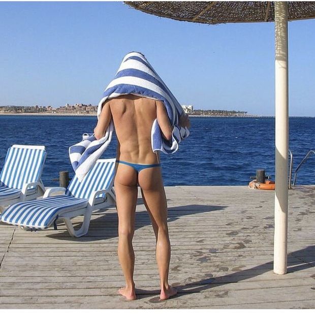Sexy ass gay man in thong at beach
