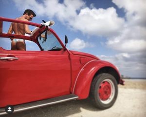 Hot guy in thong on beach