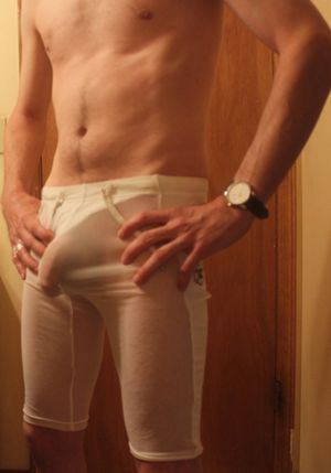 Hanging my semi hard jock cock out of the side of my compression shorts liner