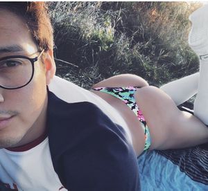 Sexy guy laying out in thong