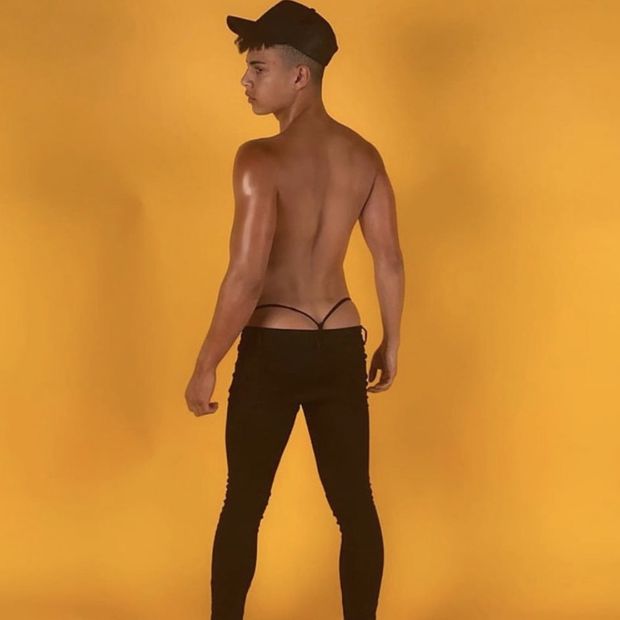 Sexy teen guy thong peeking above jeans