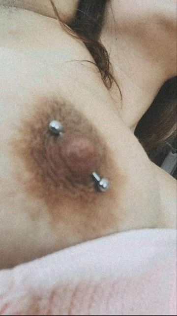 Artistic pierced nipple