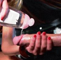 pouring the oil over a perfect cock