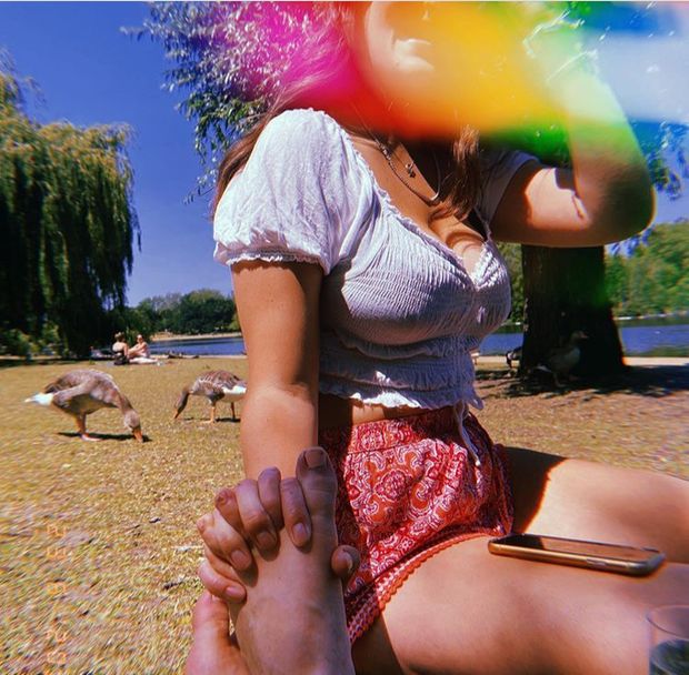 Busty teen plays with her friends feet