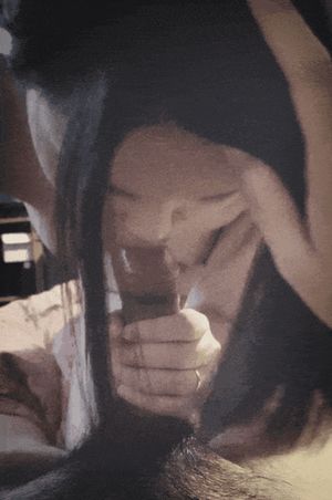Asian slut making full use of hand and cock-sucking lips to blow thick cock