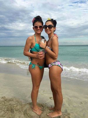 Babes drinking at the beach