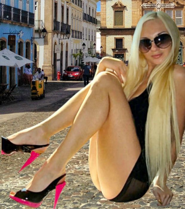 perfect blonde babe with beautiful body & legs in miniskirt very sexy posing in public on the street