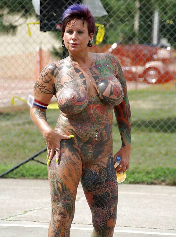 Nurse scrubs hide her tattoo's  She wants to hide your cock in her ass