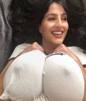 brunette with huge breasts.