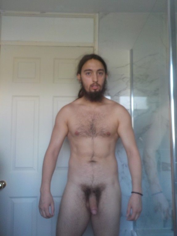 Nude standing in bathroom selfie