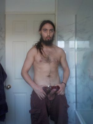 Shorts down showing erection