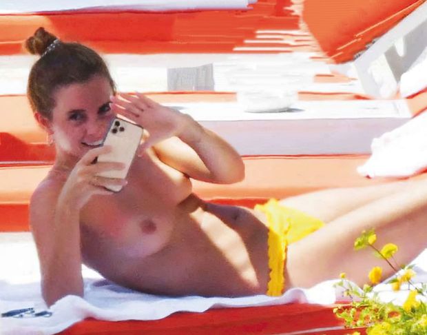 Topless Emma Watson on vacation