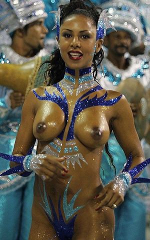 Hot body-painted woman performs completely naked at Carnival. Note the wedding ring too :).