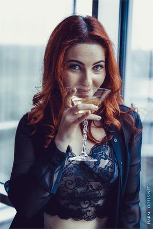 Louren from Charmmodels drinks Martini