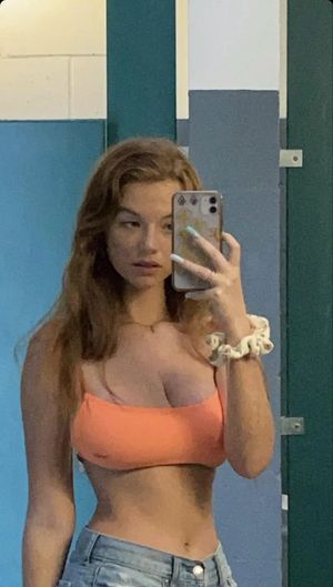 Orange top and orange hair