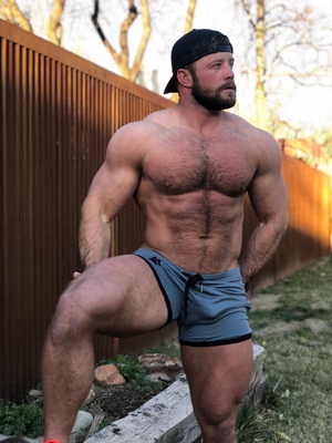 Hot muscle bear in baseball hat