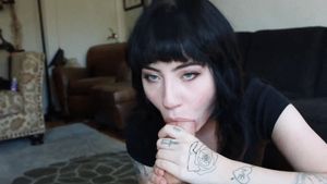 Hot alt woman sucking a dick