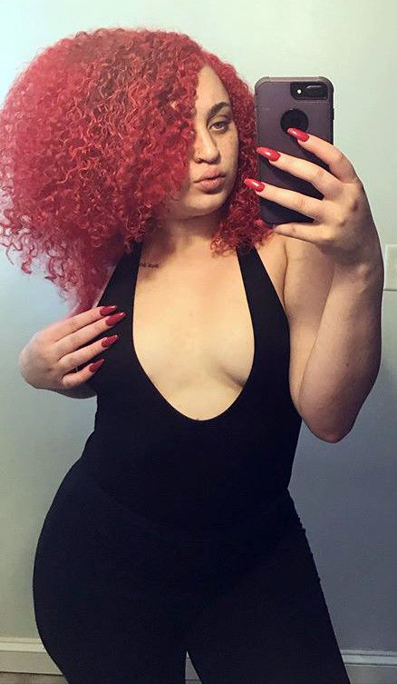selfie showing off small titties