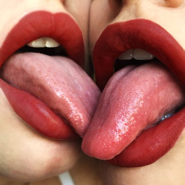 Sexy womans tongue kiss