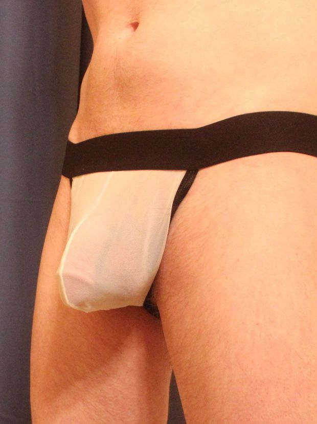 My soft cock bulging in a white mesh jockstrap