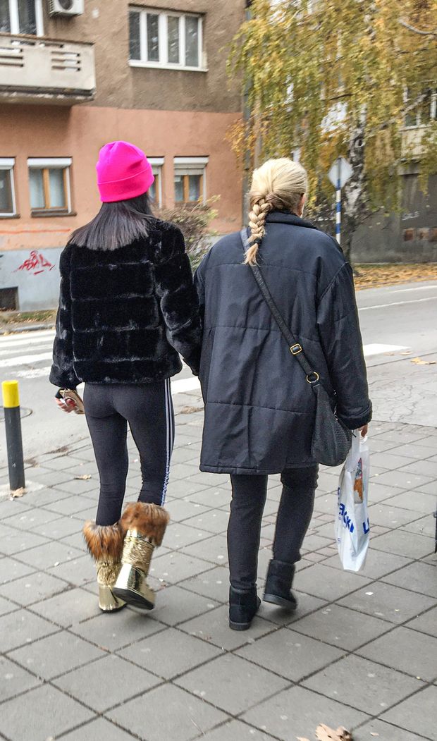 incredible ass of a teen in leggings and boots