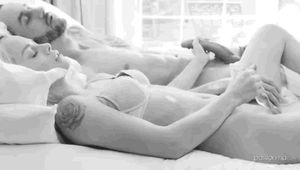 Stroking his cock while toying her pussy