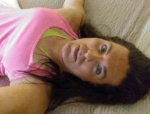 Kinky Nikki [Me] on bed ready for sex.