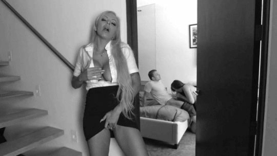 Fingering herself while watching