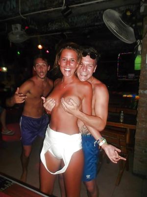They have her top off, playing with her boobs in the bar. I'll bet the rest of her clothes are next.