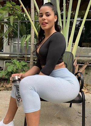 Gorgeous Latina looking flirtatious with her tongue out