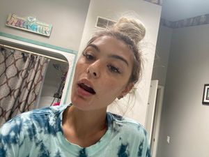 Hot slut with cum on her face.