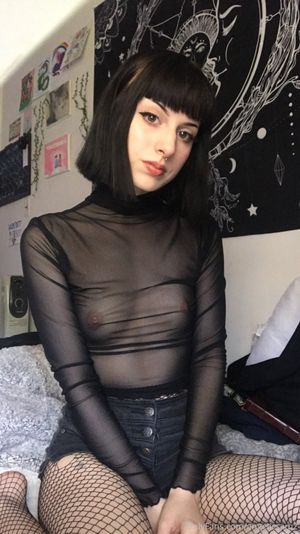 Pretty black haired goth with pierced nose