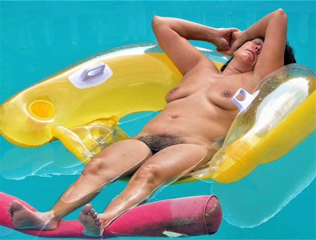 Mature Wife Sunbathing nude exposing her hairy cunt