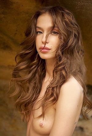 Shy Brunette Babe goes topless