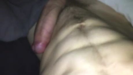 Showing hard cock in bed