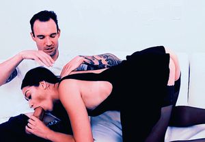 Blowjob model caressed by appreciative friend