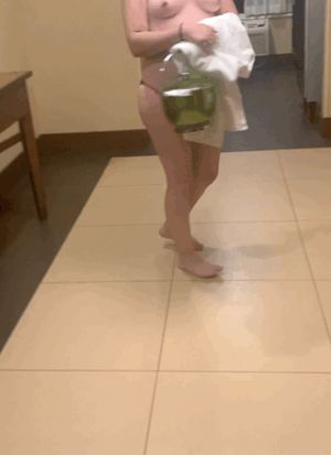 Wife lost a game so she had to walk from our room at the end of the hall down to the elevators naked.