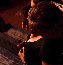 Taking off her shirt